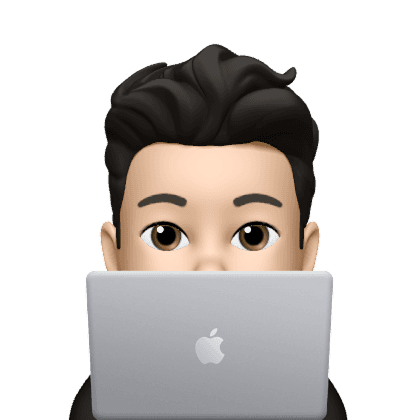 Person peeking from behind the laptop